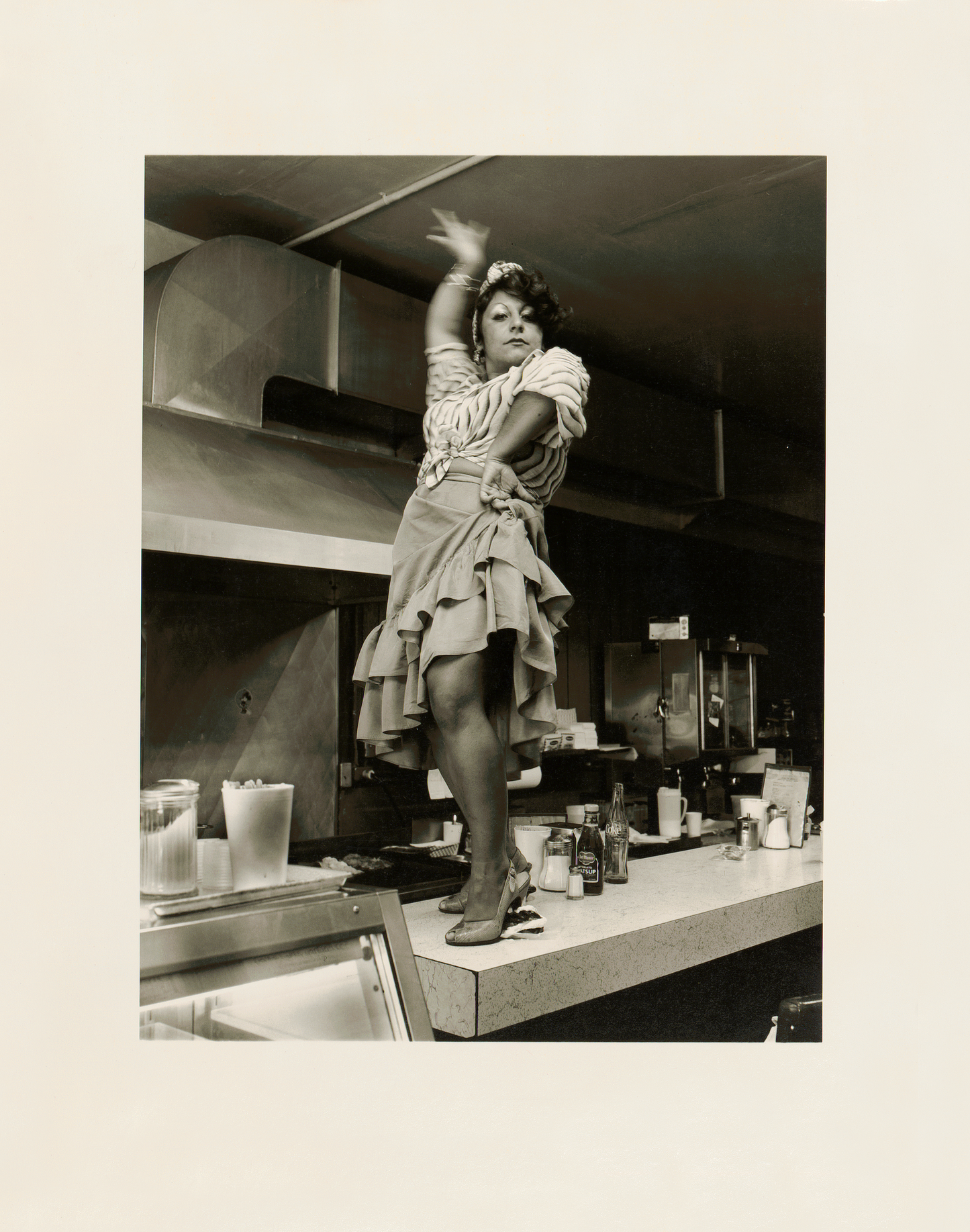 Dolores Deluce, dancing on the counter at Andy's Donut Shop